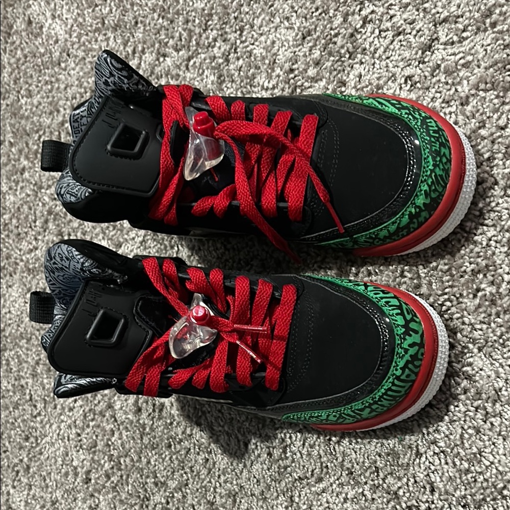 Kids Black and Green Jordan Spikes with Red Laces